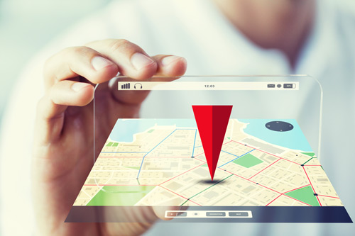 A red triangle pointing to a place on a phone's map