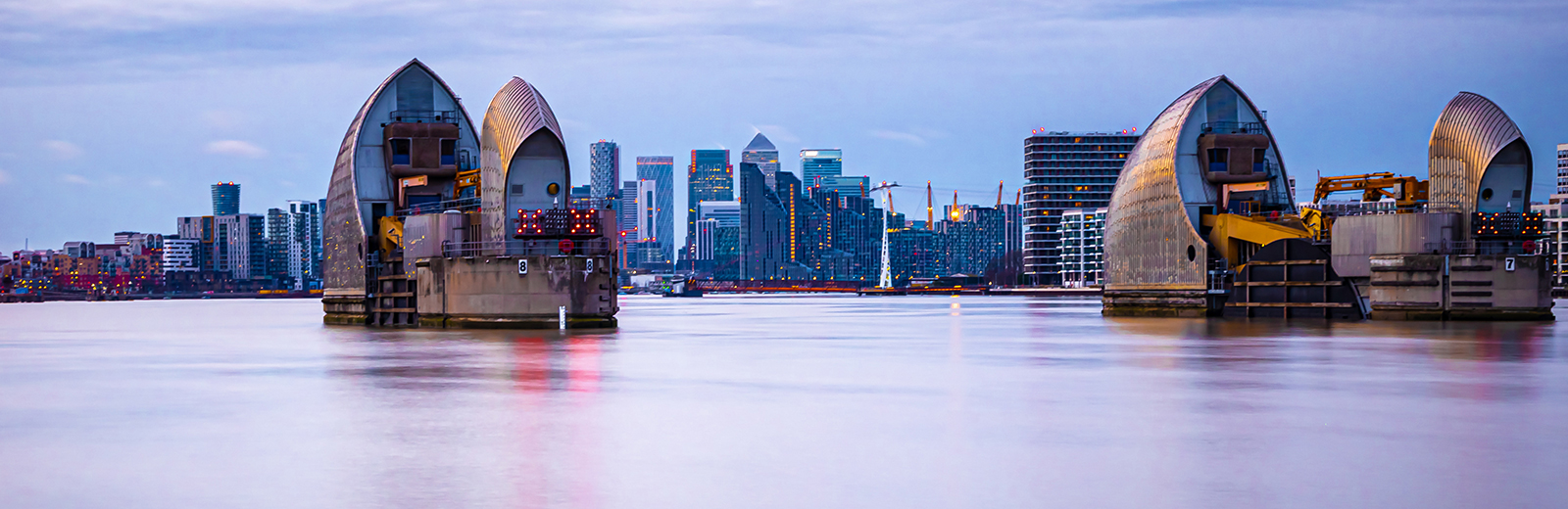 View of Canary Wharf through the Thames Barrier
