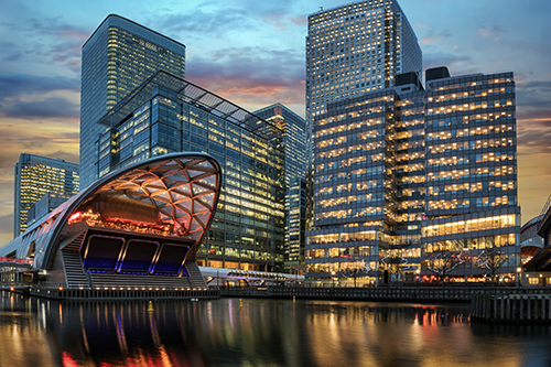 The financial district Canary Wharf in London during sunset.