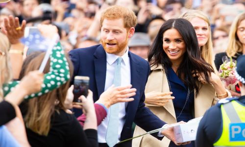 Harry and Meghan amidst a crowd