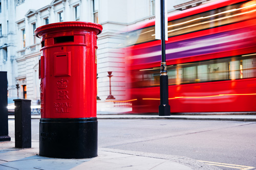Image of post box and London bus