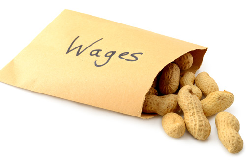 envelope containing peanuts labelled with wages on front