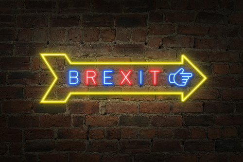 Brexit neon exit sign on brick wall